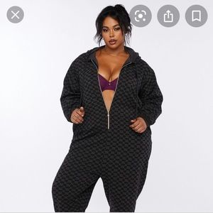 hooded onesie black pattern large - like new condition!